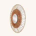 Miroir Montezuma vu de trois quarts, couronne de boucles ajourée
