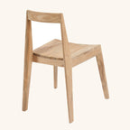 Chaise Paxi en teck vue de trois quarts arrière